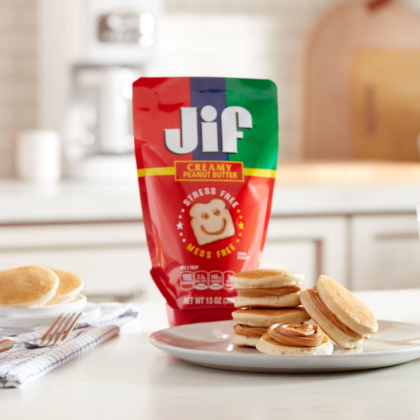 Jif Squeeze Creamy Peanut Butter, 13 oz. - Smooth, Creamy Texture, Portable Peanut Butter Pouch