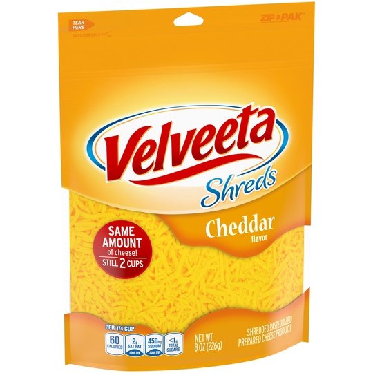 Velveeta Shreds Cheddar Flavored Shredded Cheese, 8 oz Bag