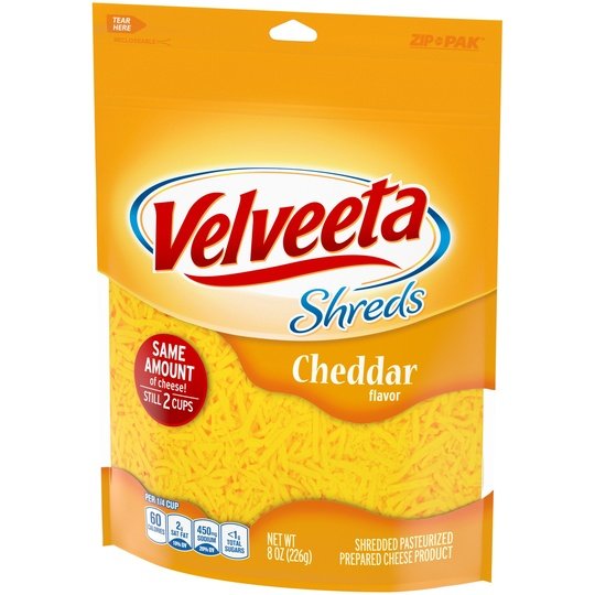 Velveeta Shreds Cheddar Flavored Shredded Cheese, 8 oz Bag